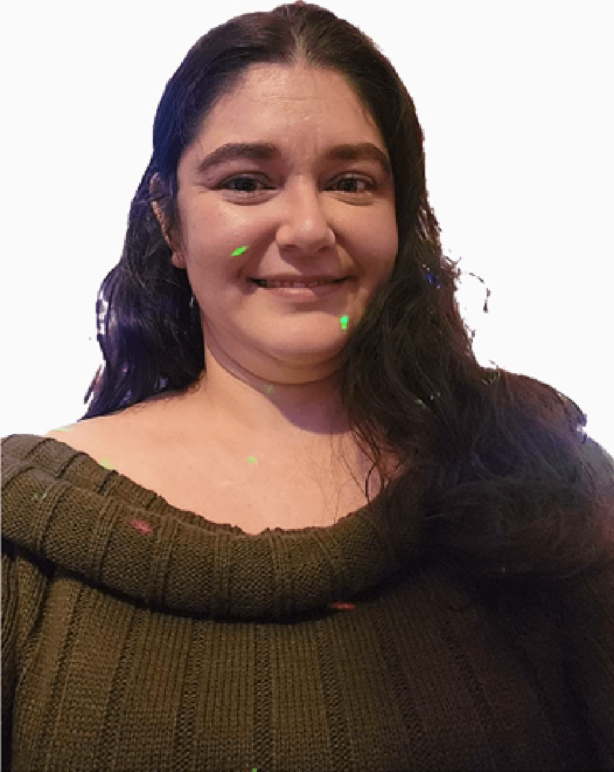 Smiling woman in brown sweater, bright background.